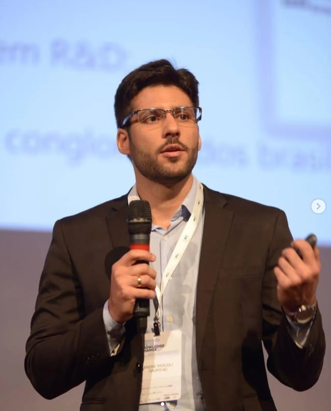André Trócoli palestrando em um evento de inovação